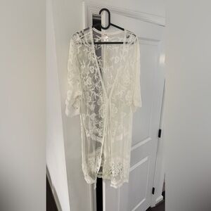Brand new women’s lace over wear size small Francesca’s